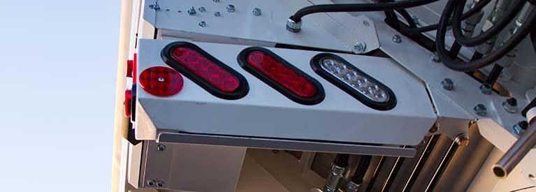 Spring-Loaded Tail Lights